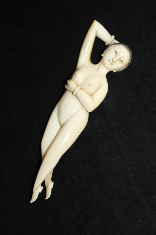 A Chinese ivory medicine figure of a nude woman, 19th century, 15cm